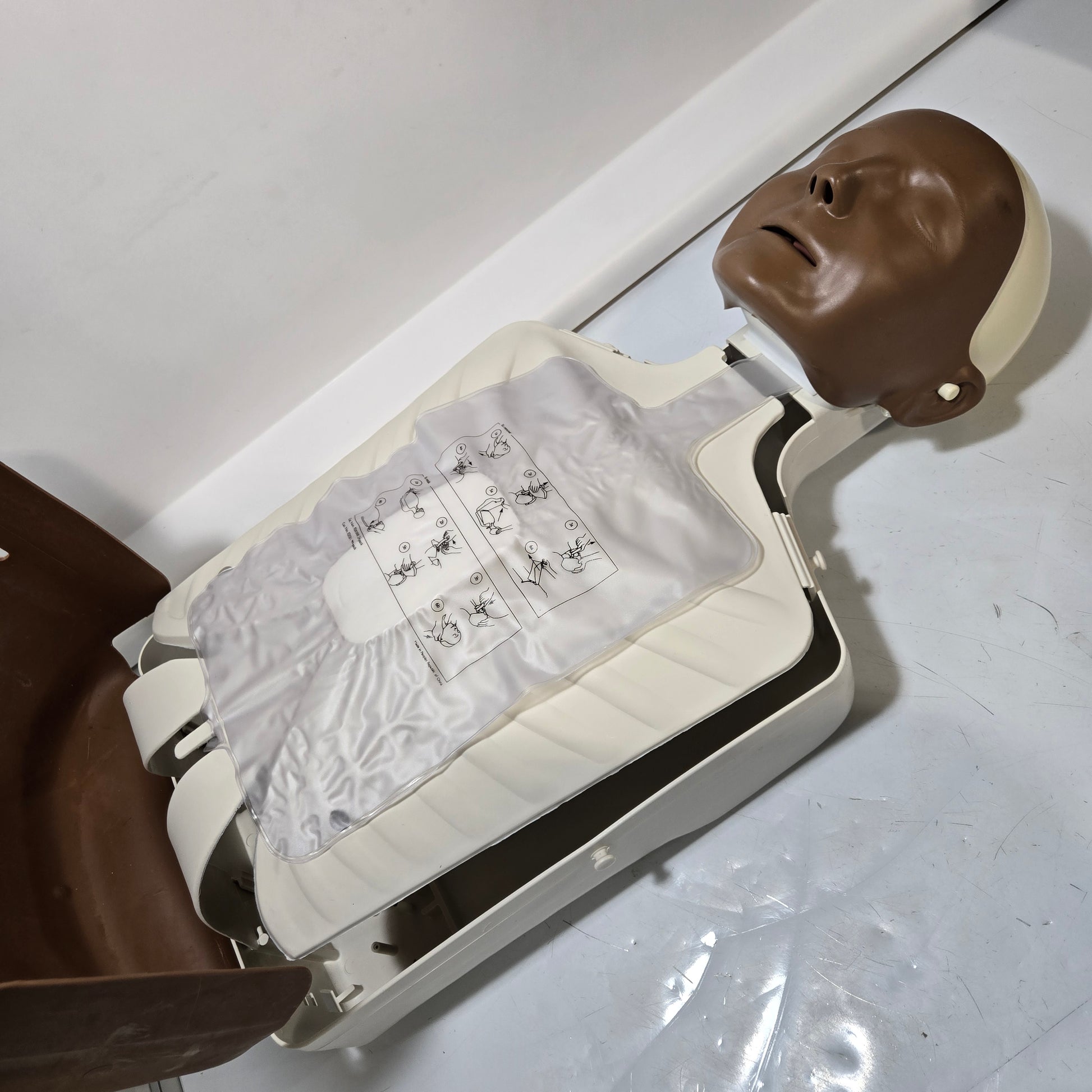 Laerdal Little Anne Adult CPR Training Manikin Dark Skin Non-QCPR 120-03050 Body Open